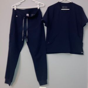 Figs scrub set. Both are medium navy. Top has zipper and kangaroo pouch